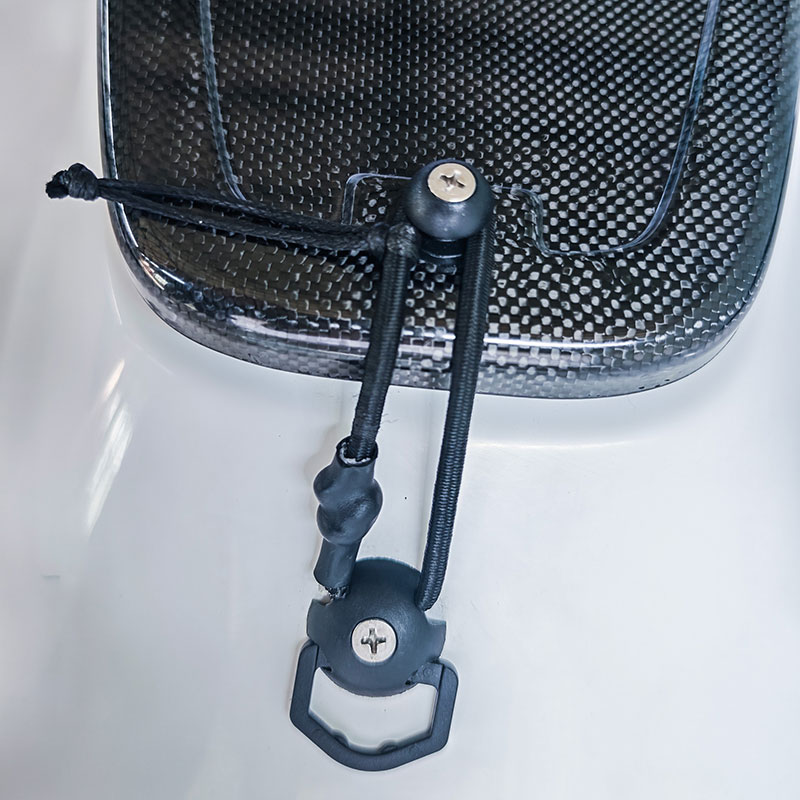 Carbon hatch with bungee tie-down over the livewell bulkhead