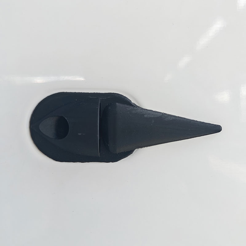 Moulded deck cleat bonded into the hull with no visible fasteners